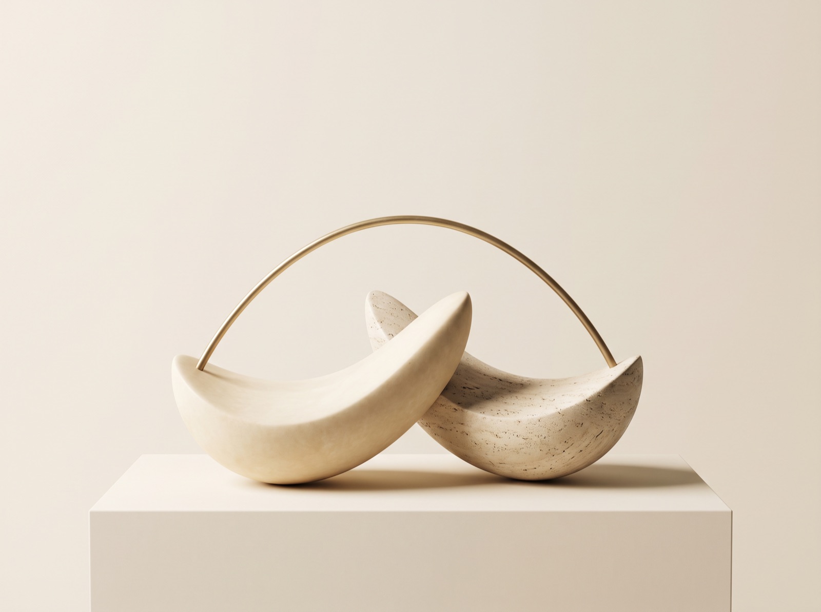 Abstract sculpture of two smooth stone forms in balance joined by a fine gold arc — a visual metaphor for the jaw joint working in harmony